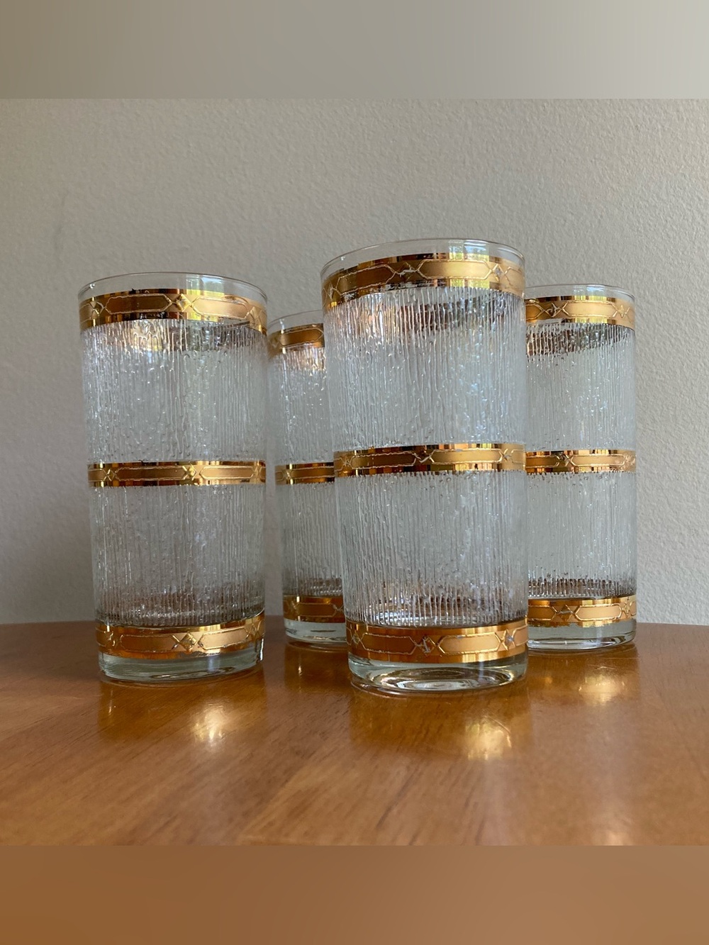 Set of 4 MCM highball glasses with gold accents